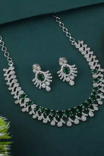 Green color american diamond necklace set with modern circular stone detailing