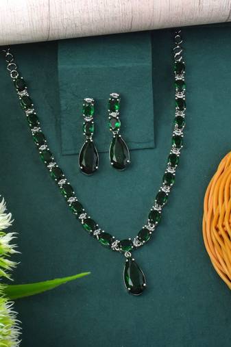Green color american diamond necklace set with elegant floral design