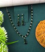 Green color american diamond necklace set with elegant floral design
