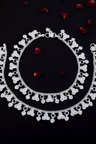 Beautiful silver color anklets crafted with intricate artistic detailing for wedding functions