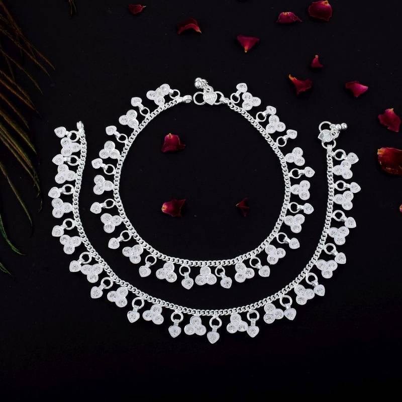 Beautiful silver color anklets crafted with intricate artistic detailing for wedding functions