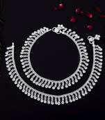 Beautiful silver color anklets designed with traditional indian artistic craft for wedding events