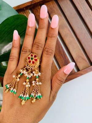 Rajwadi plated brass adjustable finger ring with floral design, pearl beads & green latkan chains for women  1