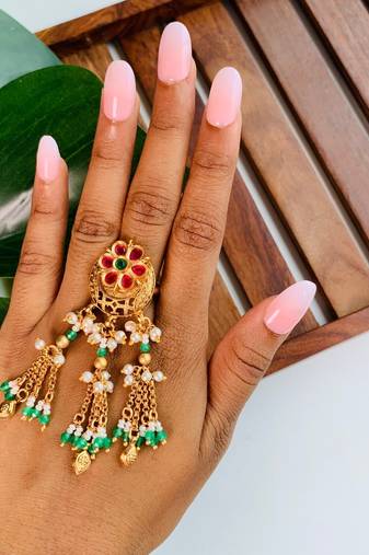 Rajwadi plated brass adjustable finger ring with floral design, pearl beads & green latkan chains for women 