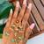 Rajwadi plated brass adjustable finger ring with pearl beads & green latkan chain detailing for women 