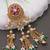 Rajwadi plated brass adjustable finger ring with pearl beads & green latkan chain detailing for women 