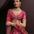Rani Pink Wedding Lehenga with Embroidery, Heavy Flair & Unstitched Blouse – Bridal Wear 2025