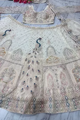 Cream Embroidererd Net Lehenga Set With Dupatta