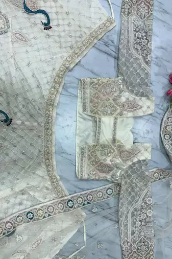 Cream Embroidererd Net Lehenga Set With Dupatta