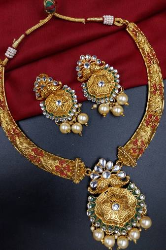 ​antique gold plated rubygreen  & gold meenakari necklace set with pearl drops.
