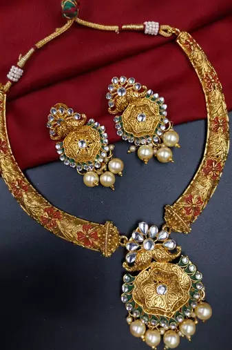 ​antique gold plated rubygreen  & gold meenakari necklace set with pearl drops.