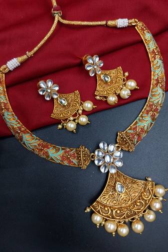 ​antique gold plated rubygreen  & gold meenakari necklace set with pearl drops.