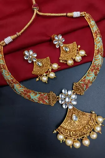 ​antique gold plated rubygreen  & gold meenakari necklace set with pearl drops.
