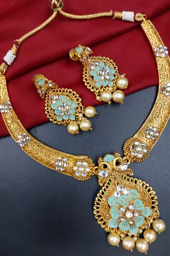 ​antique gold plated mint & gold meenakari necklace set with pearl drops.