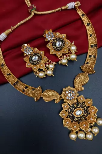 ​antique gold plated black & gold meenakari necklace set with pearl drops.