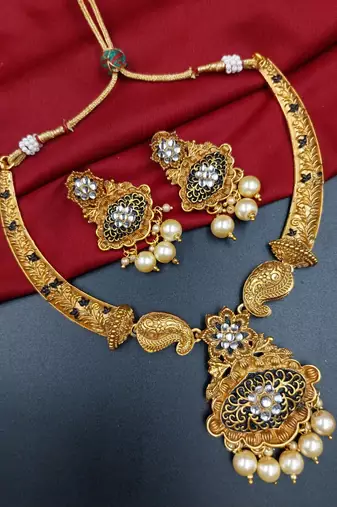 ​antique gold plated black & gold meenakari necklace set with pearl drops.