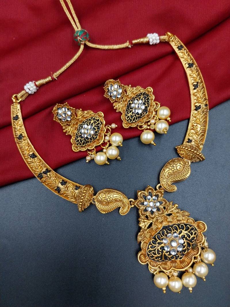 ​antique gold plated black & gold meenakari necklace set with pearl drops.
