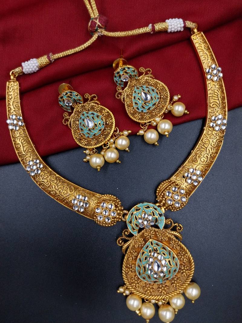 ​antique gold plated mint & gold meenakari necklace set with pearl drops.