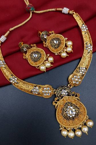 ​antique gold plated black & gold kundan meenakari necklace set with pearl drops.