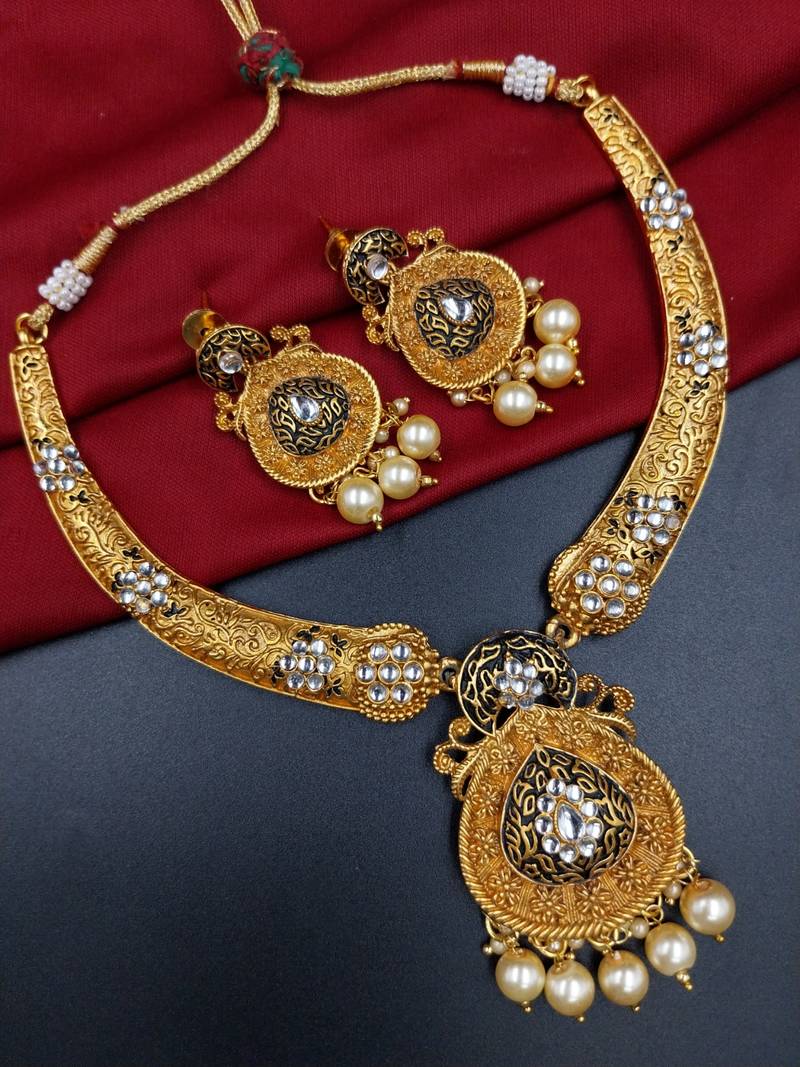 ​antique gold plated black & gold kundan meenakari necklace set with pearl drops.
