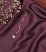 Gold-plated kundan studded maang tikka