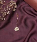 Girls gold-plated kundan studded & beads beaded maang tikka