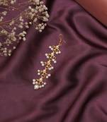 Girls gold-plated kundan studded & beaded maang tikka