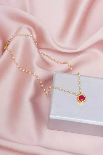 Girls gold-plated kundan studded & beaded necklace