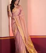 Pastel pink dual tone linen tissue saree with zari and tassels, with blouse