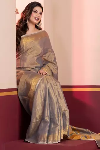 Grey gold dual tone linen tissue saree with zari and tassels, with blouse
