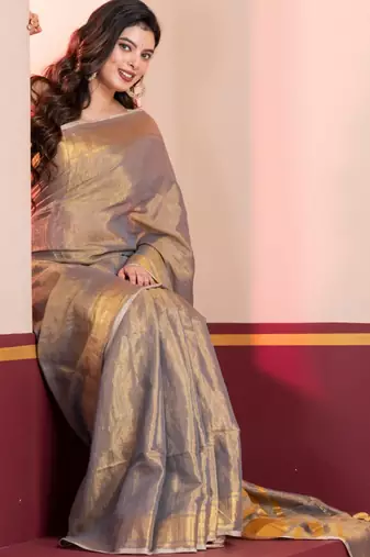 Grey gold dual tone linen tissue saree with zari and tassels, with blouse