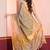 Grey gold dual tone linen tissue saree with zari and tassels, with blouse