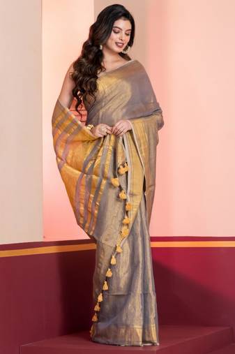 Grey gold dual tone linen tissue saree with zari and tassels, with blouse