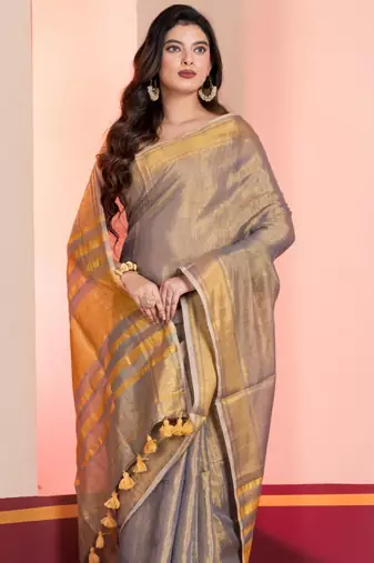 Grey gold dual tone linen tissue saree with zari and tassels, with blouse