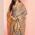 Grey gold dual tone linen tissue saree with zari and tassels, with blouse