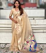 cream soft organza saree with unstiched blouse