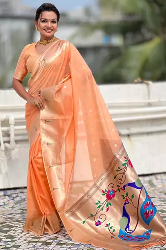 light orange soft organza saree with unstiched blouse