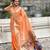 light orange soft organza saree with unstiched blouse