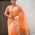 light orange soft organza saree with unstiched blouse