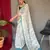 Off white printed cotton saree with blouse piece