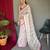 Off white printed cotton saree with blouse piece