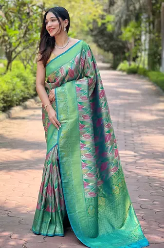 Green woven kanchipuram silk saree with blouse piece