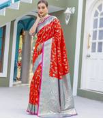 Red woven banarasi saree with blouse piece
