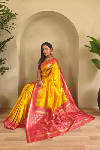Yellow woven kanchipuram silk saree with blouse piece