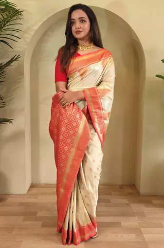 Beige woven kanchipuram silk saree with blouse piece