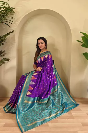 Purple woven kanchipuram silk saree with blouse piece