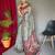 Green printed cotton saree with blouse piece