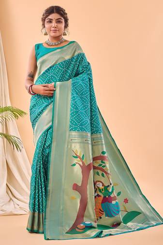 Turquoise woven silk saree with blouse piece