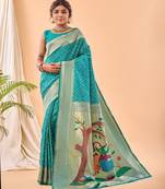 Turquoise woven silk saree with blouse piece