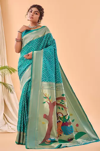 Turquoise woven silk saree with blouse piece